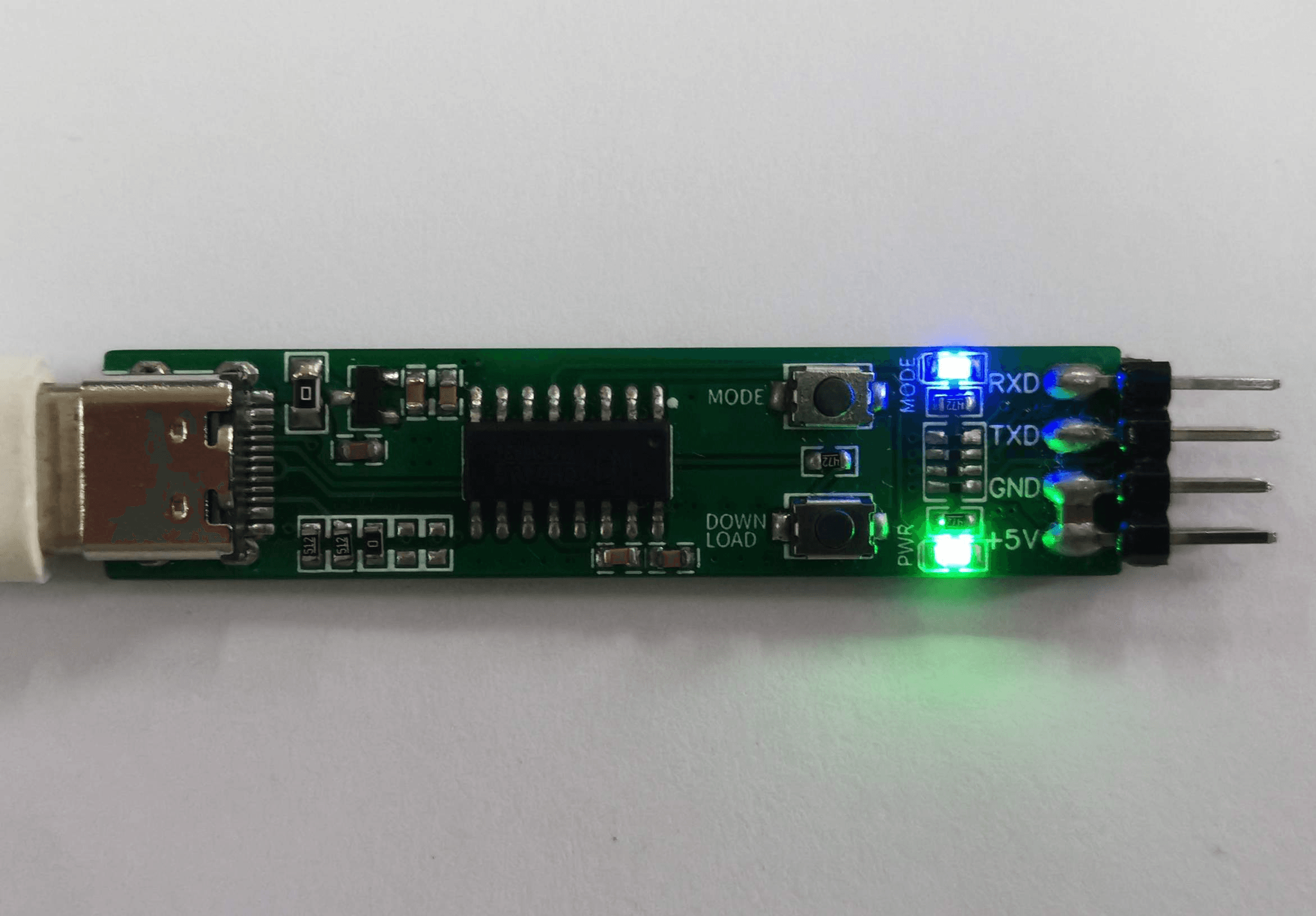 A narrow USB-C stick version with a CH549, a MODE button, a DOWNLOAD button and a four-pin RXD/TXD/GND/5V header