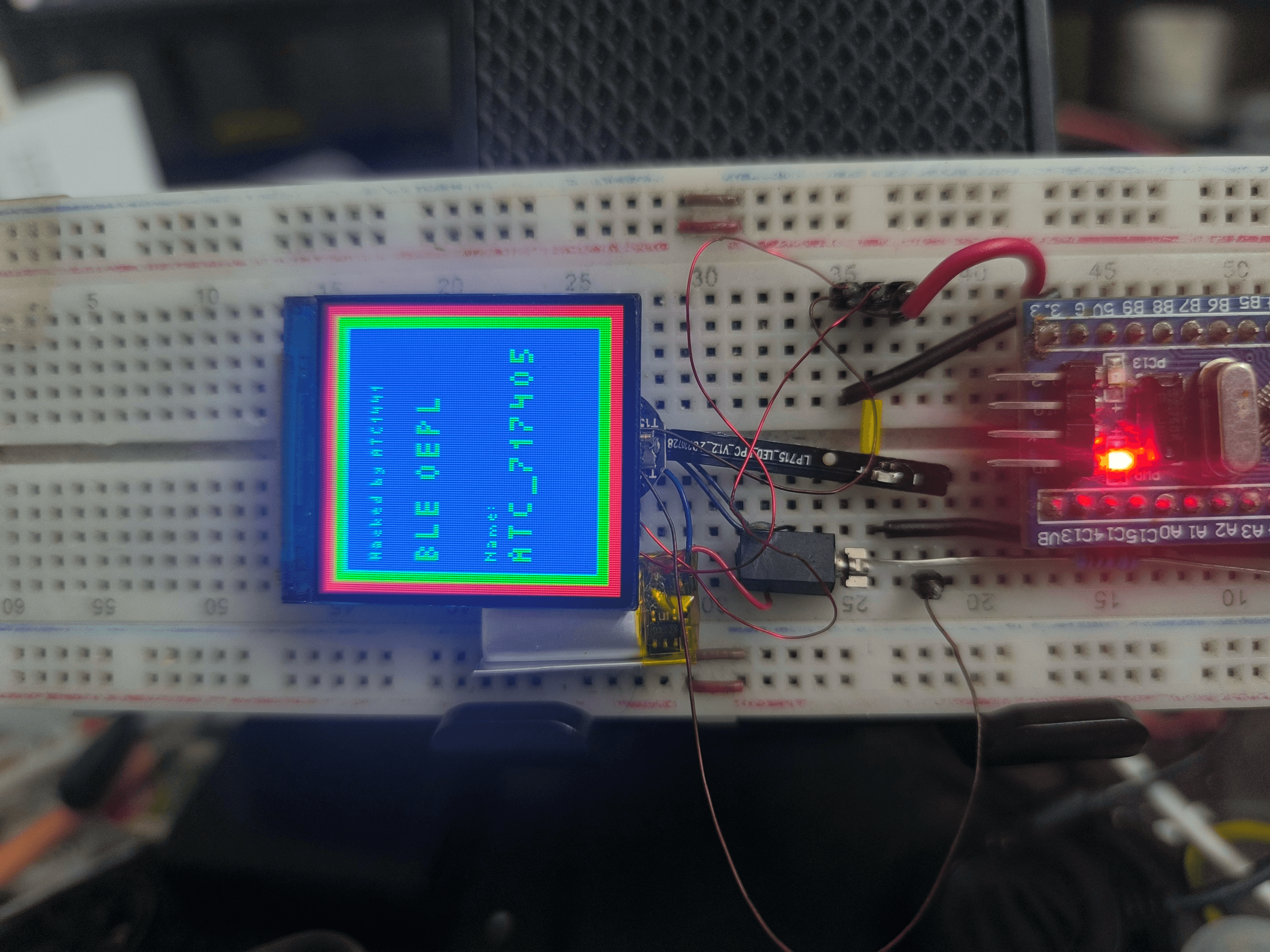 The watch running OpenEPaperLink firmware