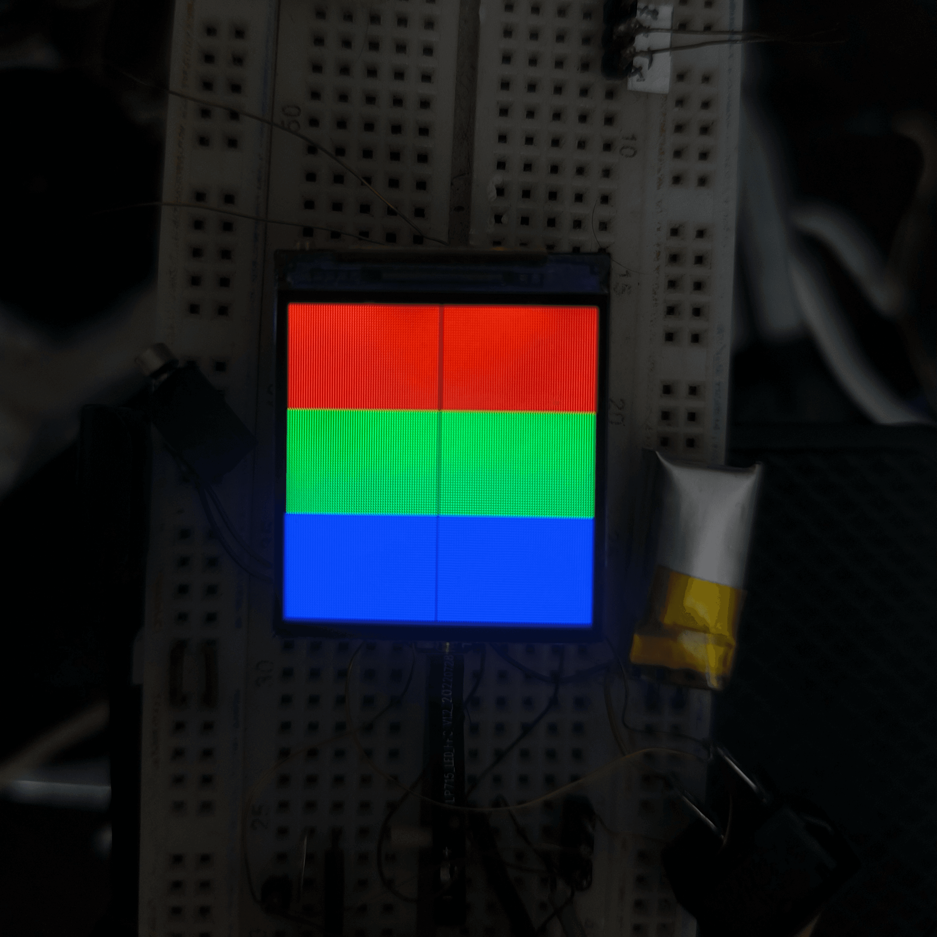 The color test firmware showing red, green and blue bars